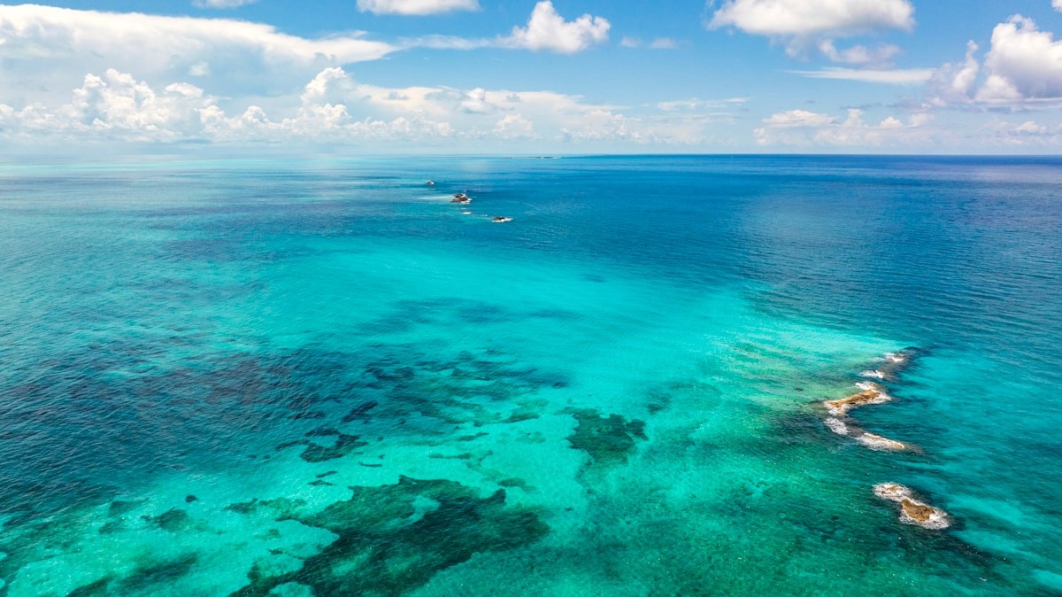 A turquoise reef and open water in Saint Vincent and the Grenadines