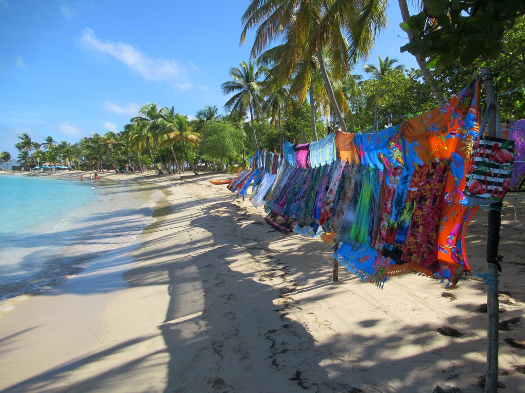 A beachside market stall with local produce at Salt Whistle Bay, Mayreau